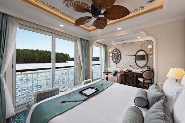 Uniworld Boutique River Cruises Mekong Jewel Suite Bedroom.jpg